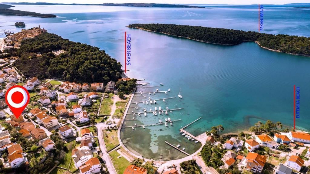 an aerial view of a harbor with boats in the water at Apartmani Miš Rab in Palit