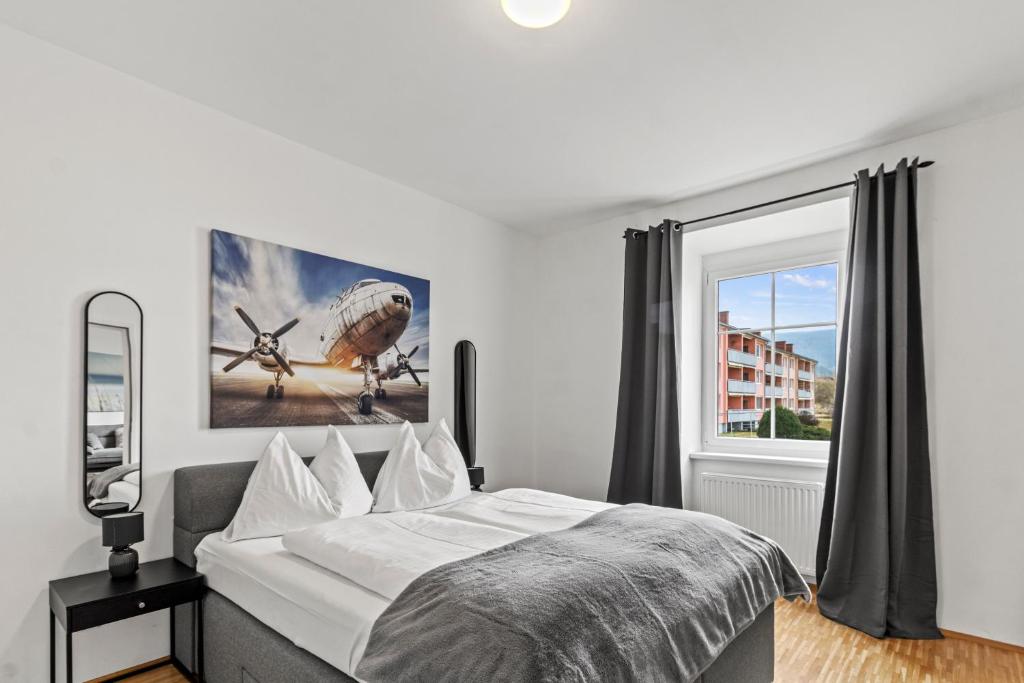 Llit o llits en una habitació de StayEasy Apartments Krieglach W2