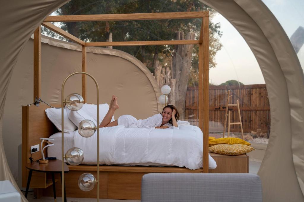 Postel nebo postele na pokoji v ubytování Bubble Room Suite Experience - Bolla Savio Ravenna