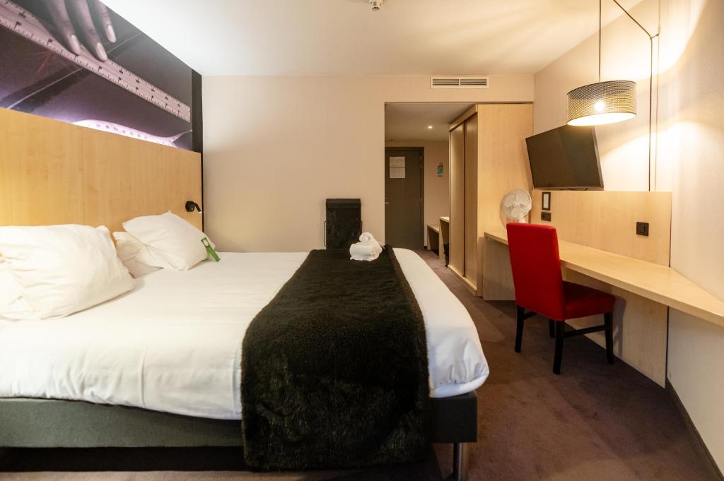 Postel nebo postele na pokoji v ubytování Hotel & Aparthotel Alize Mouscron
