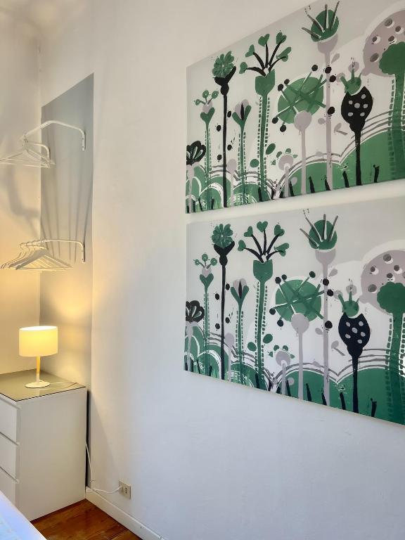 A bed or beds in a room at ComeCasa 2 bedrooms Apartment in via Curtatone