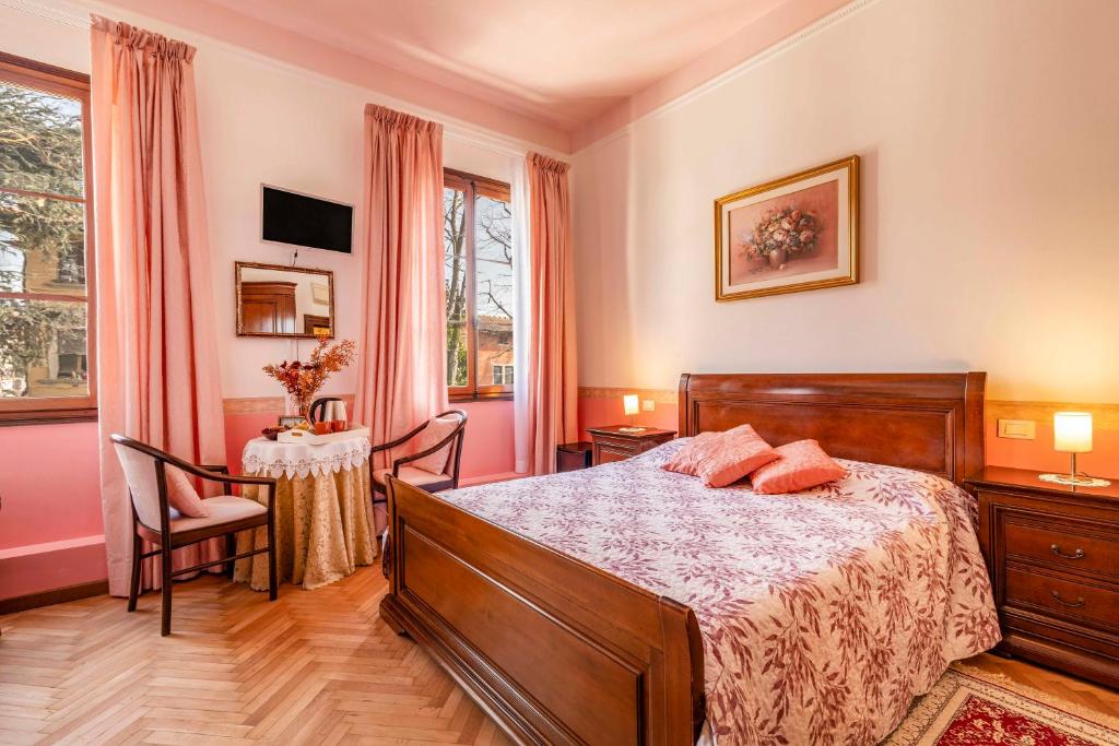 Postel nebo postele na pokoji v ubytování Bed and Breakfast Casa delle Rose Lido Venezia