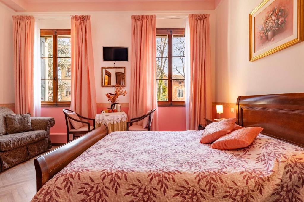 Postel nebo postele na pokoji v ubytování Bed and Breakfast Casa delle Rose Lido Venezia