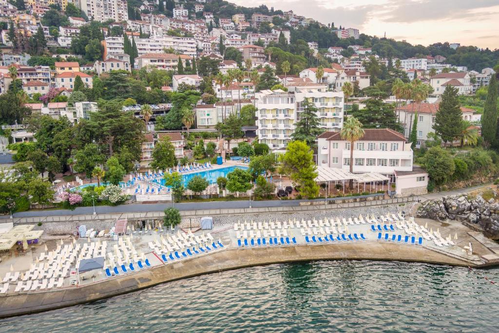 a view of a resort with a pool and buildings at Hunguest Hotel Sun Resort in Herceg-Novi