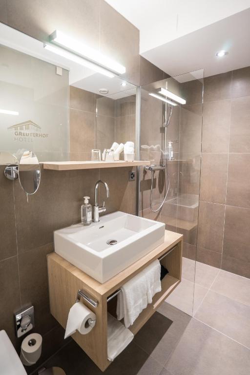 Koupelna v ubytování Hotel Greuterhof Islikon
