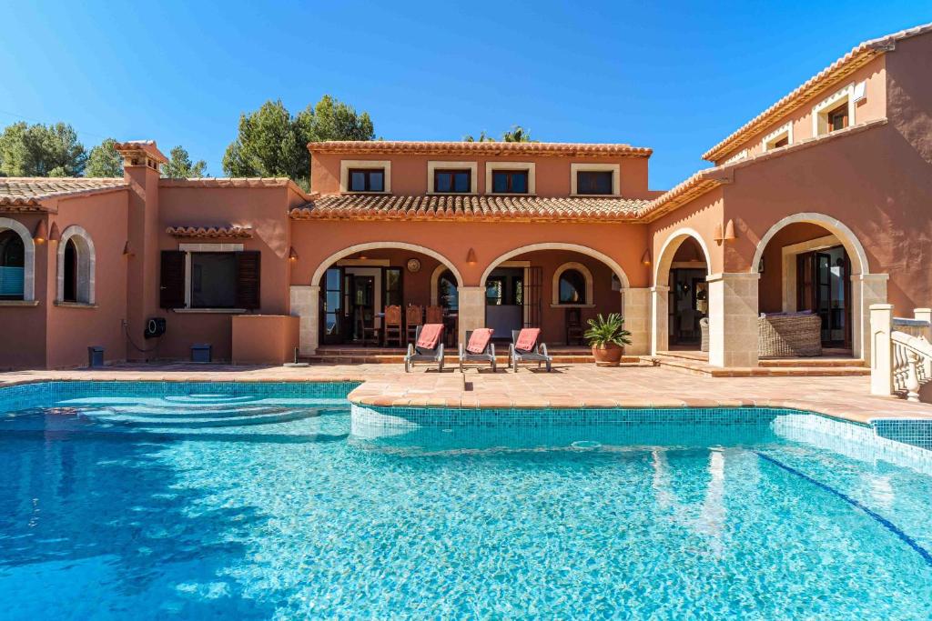 Bazén v ubytování Villa Tosca Javea by Rock Rentals nebo v jeho okolí