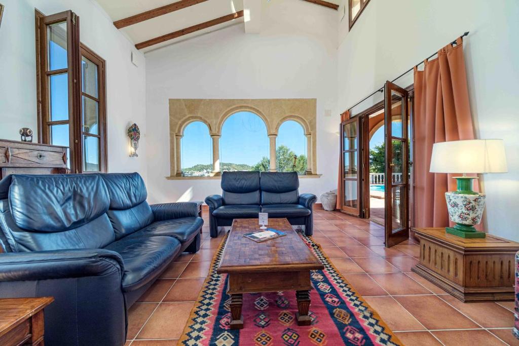 Posezení v ubytování Villa Tosca Javea by Rock Rentals