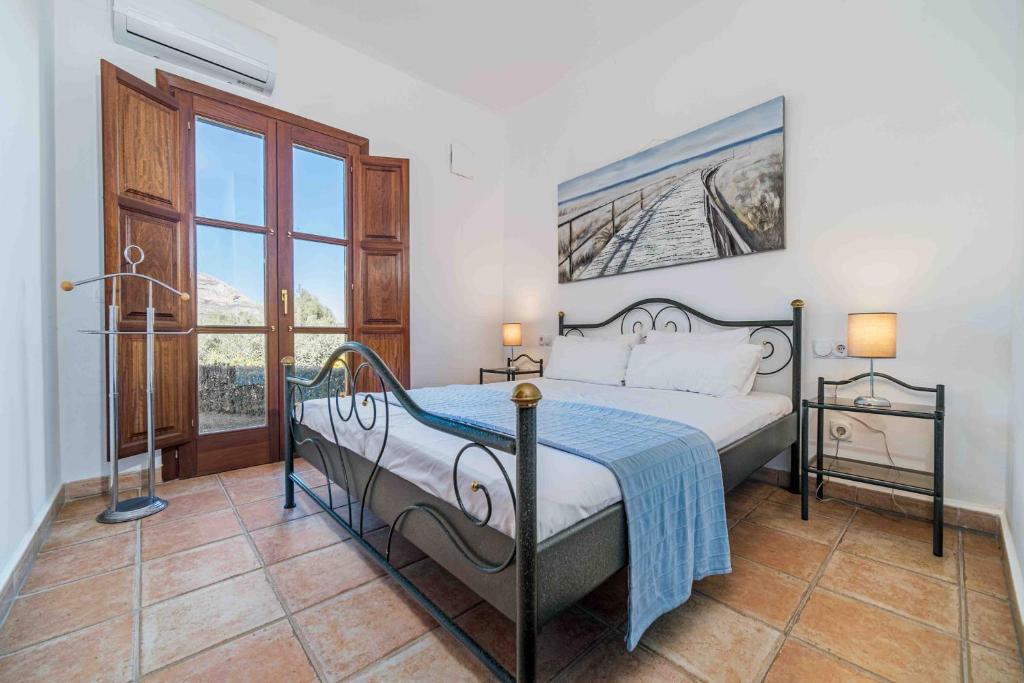 Postel nebo postele na pokoji v ubytování Villa Tosca Javea by Rock Rentals