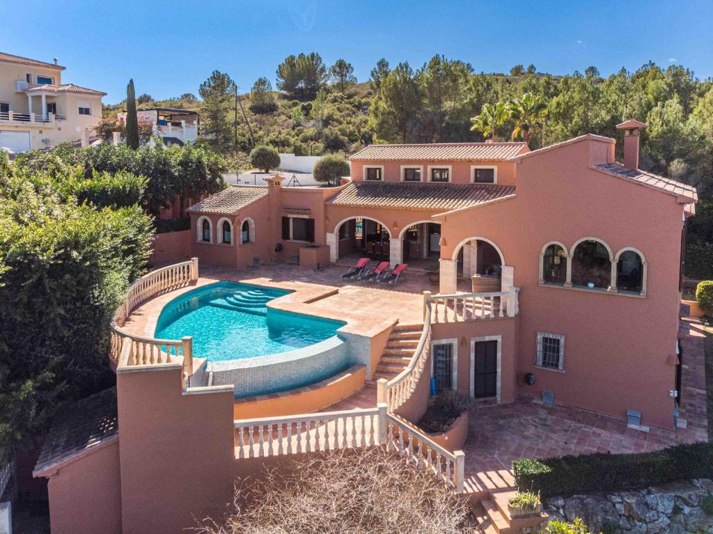 Bazén v ubytování Villa Tosca Javea by Rock Rentals nebo v jeho okolí