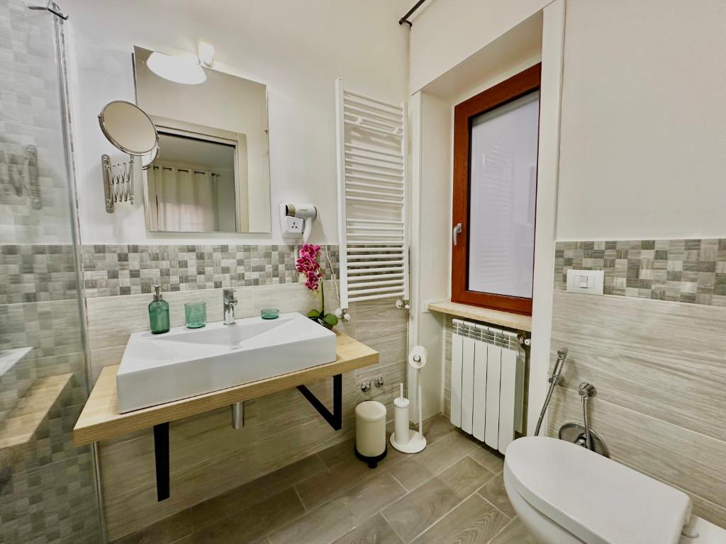 Koupelna v ubytování Room Center Sorrento Baby