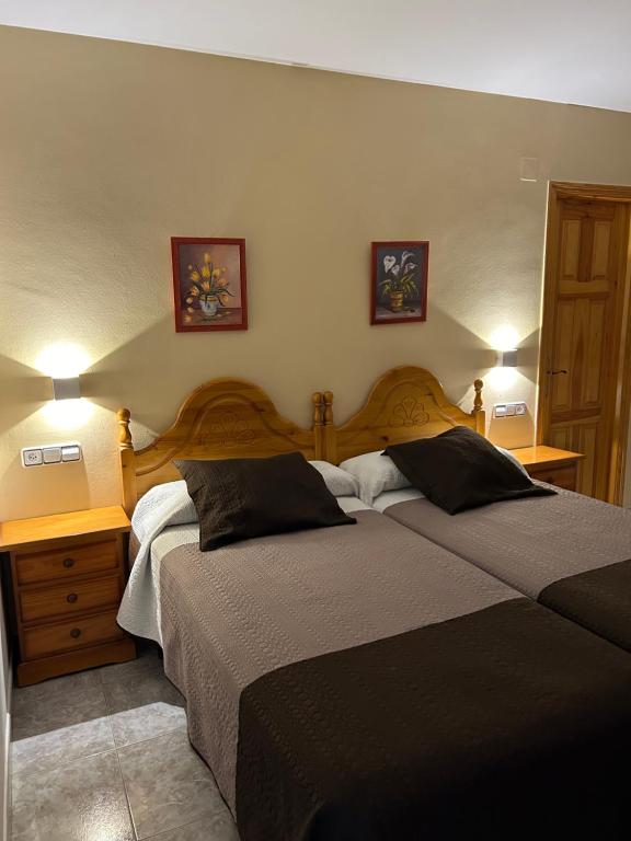 Cama o camas de una habitación en Hostal Casa Vispe