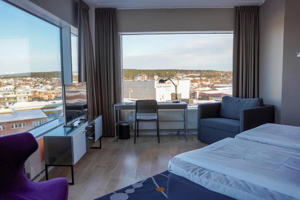 Postel nebo postele na pokoji v ubytování Comfort Hotel Winn