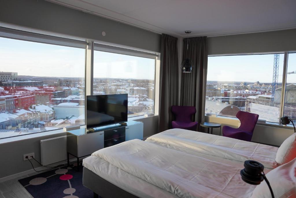 Postel nebo postele na pokoji v ubytování Comfort Hotel Winn