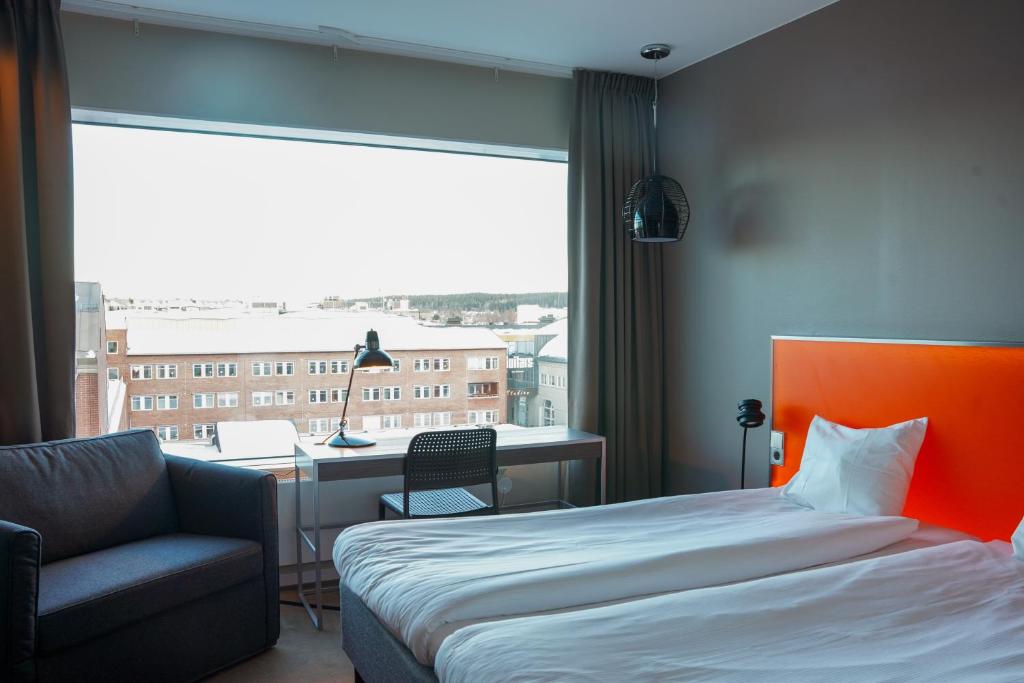 Postel nebo postele na pokoji v ubytování Comfort Hotel Winn