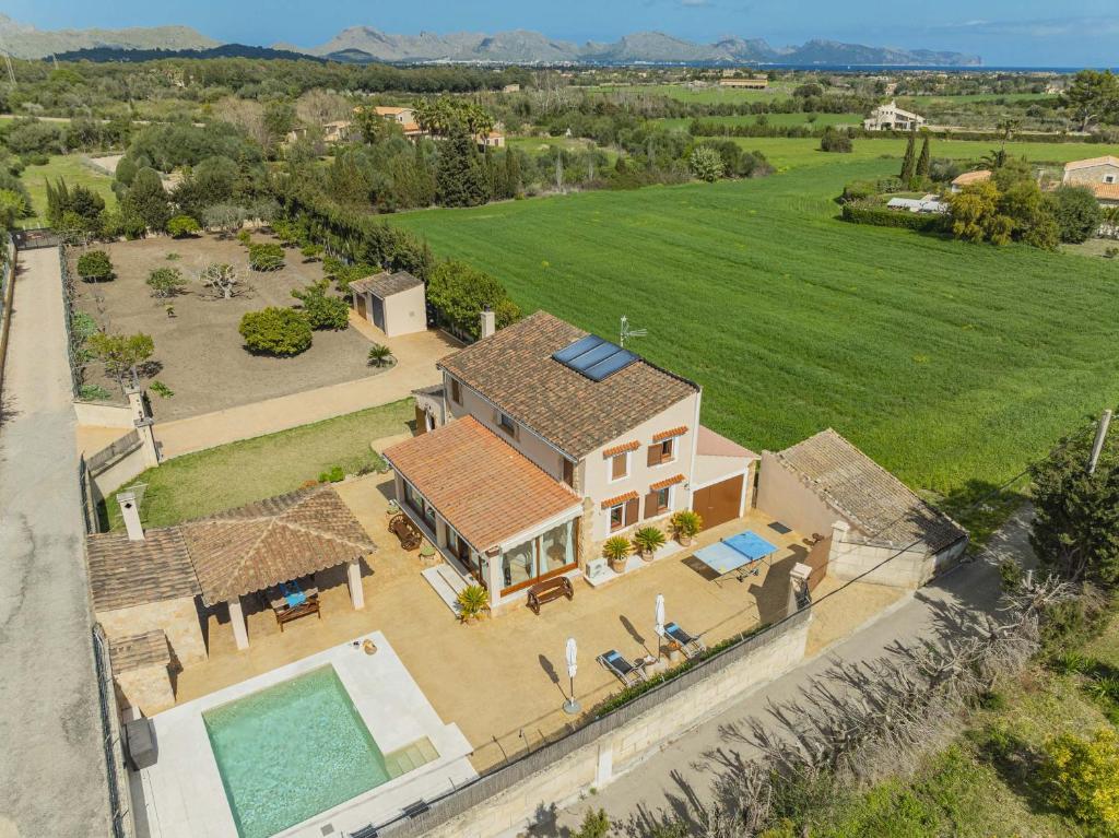 an aerial view of a house with a swimming pool at Villa Son Rotger in Alcudia