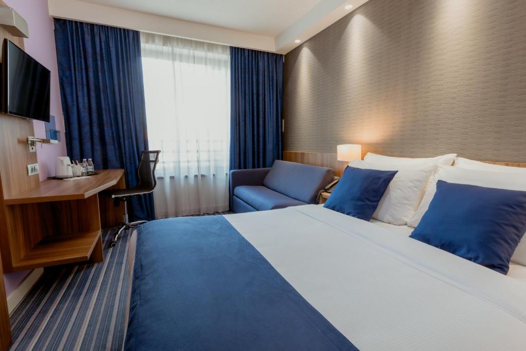 Postel nebo postele na pokoji v ubytování Nobel Palace Hotel