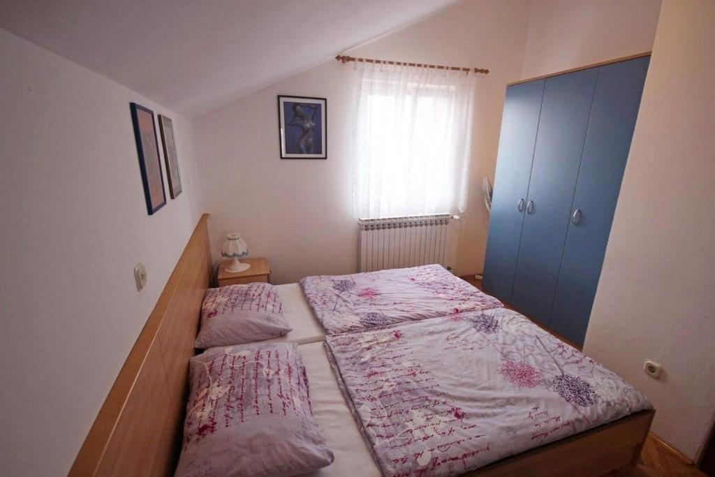 Posteľ alebo postele v izbe v ubytovaní Apartments Barisic