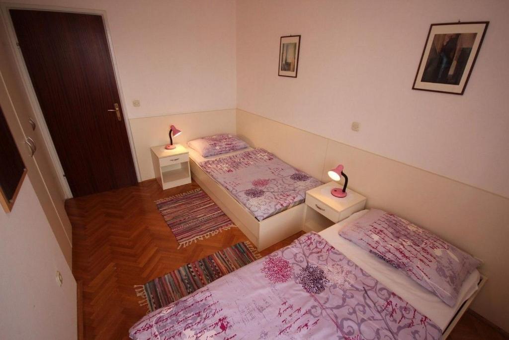 Posteľ alebo postele v izbe v ubytovaní Apartments Barisic