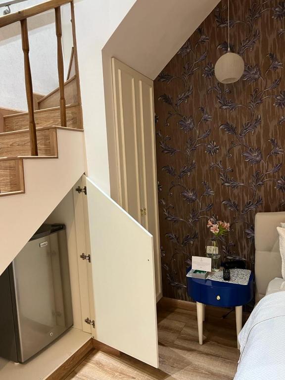 Postel nebo postele na pokoji v ubytování Adamas House Hotel Boutique