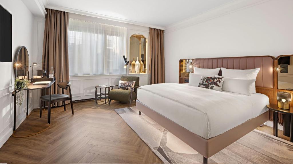 Postel nebo postele na pokoji v ubytování Hotel Bristol Berlin