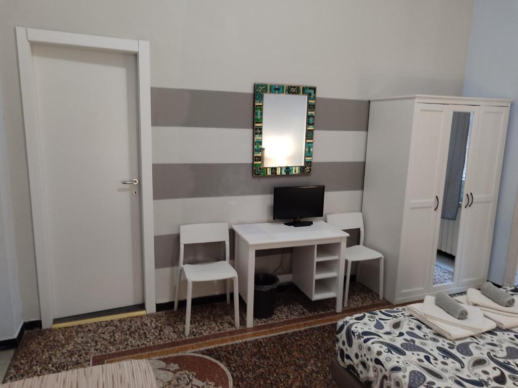 Postel nebo postele na pokoji v ubytování Albergo Locanda Alambra
