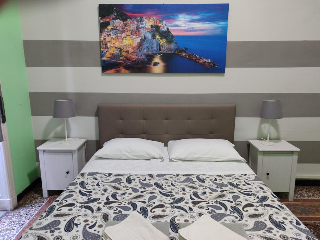 Postel nebo postele na pokoji v ubytování Albergo Locanda Alambra