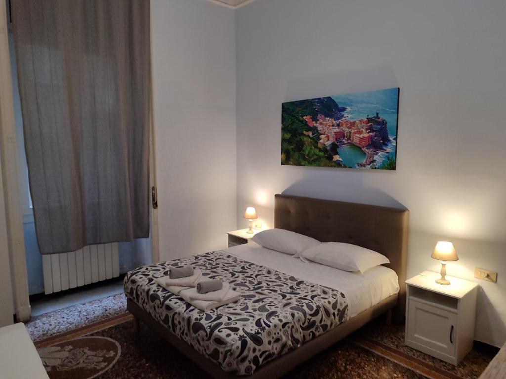 Postel nebo postele na pokoji v ubytování Albergo Locanda Alambra