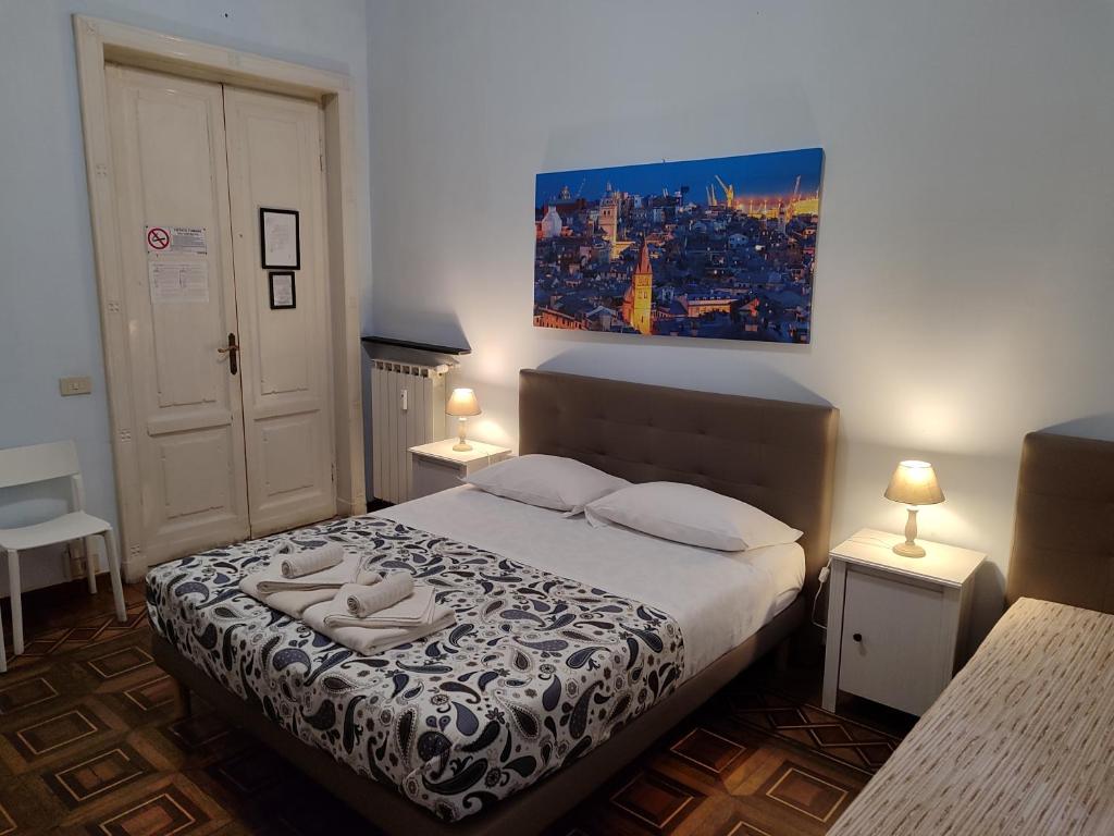 Postel nebo postele na pokoji v ubytování Albergo Locanda Alambra