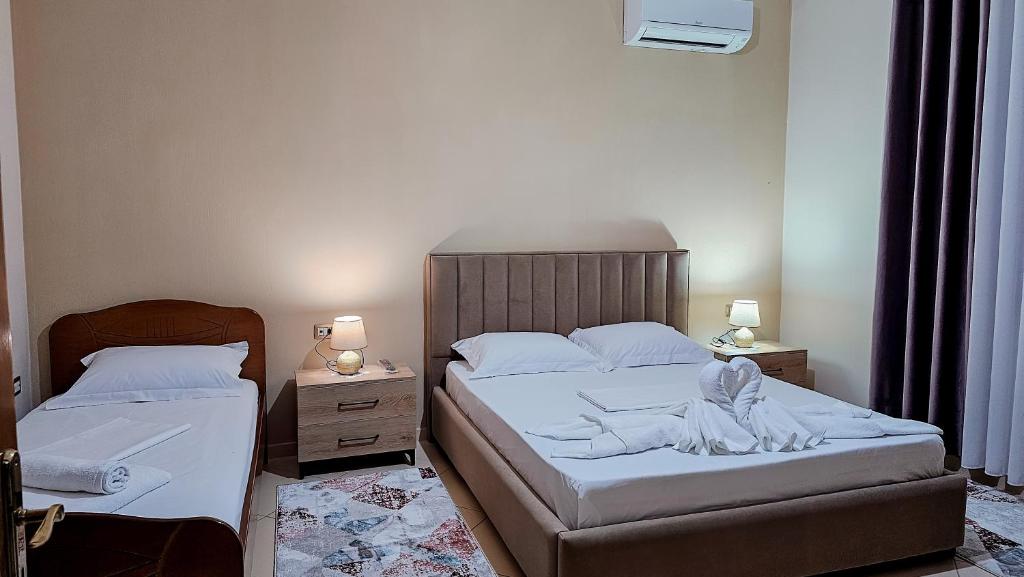 Voodi või voodid majutusasutuse Guest House Edison toas