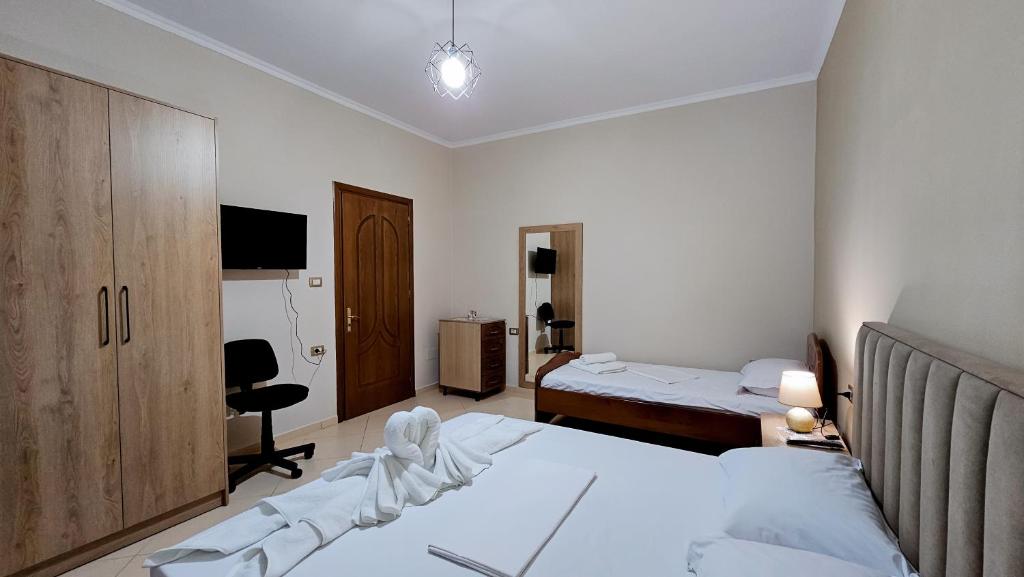 Voodi või voodid majutusasutuse Guest House Edison toas