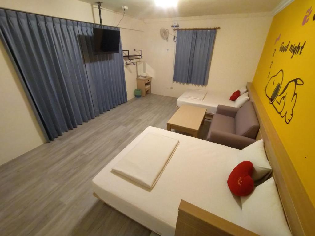 TV a/nebo společenská místnost v ubytování Penghu Le You You Homestay