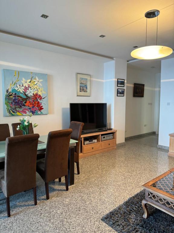 TV a/nebo společenská místnost v ubytování Seaview Tower Apartment