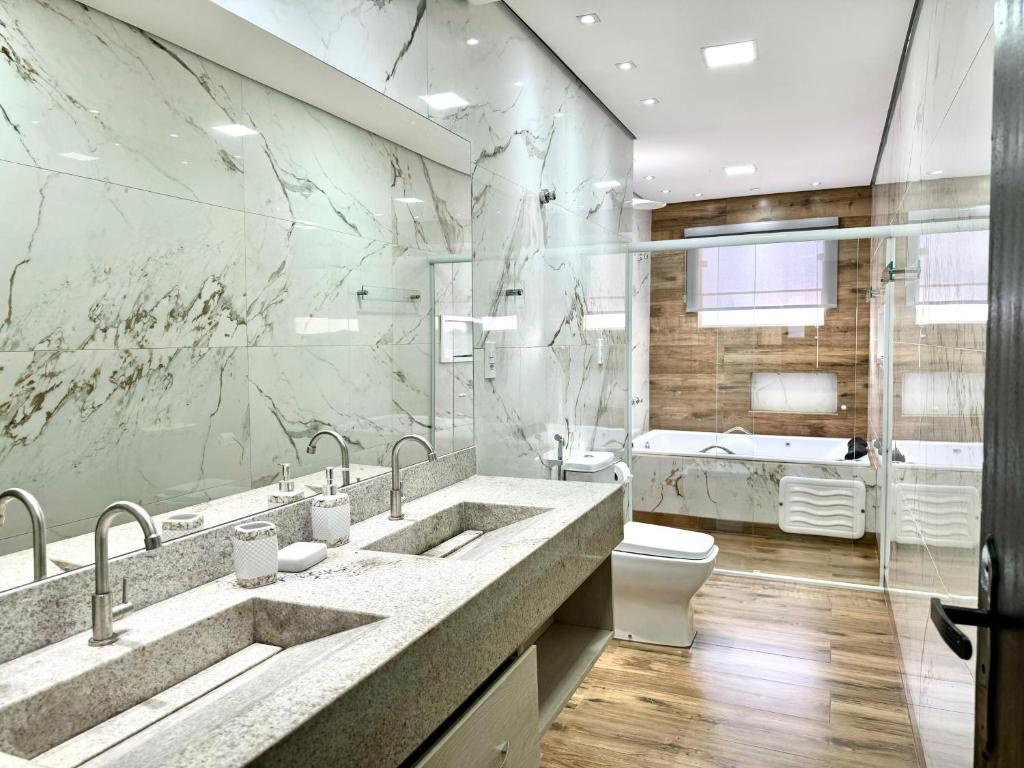 Phòng tắm tại Apartamentos a 200m do centro - Hospedaria Villa da Pedra