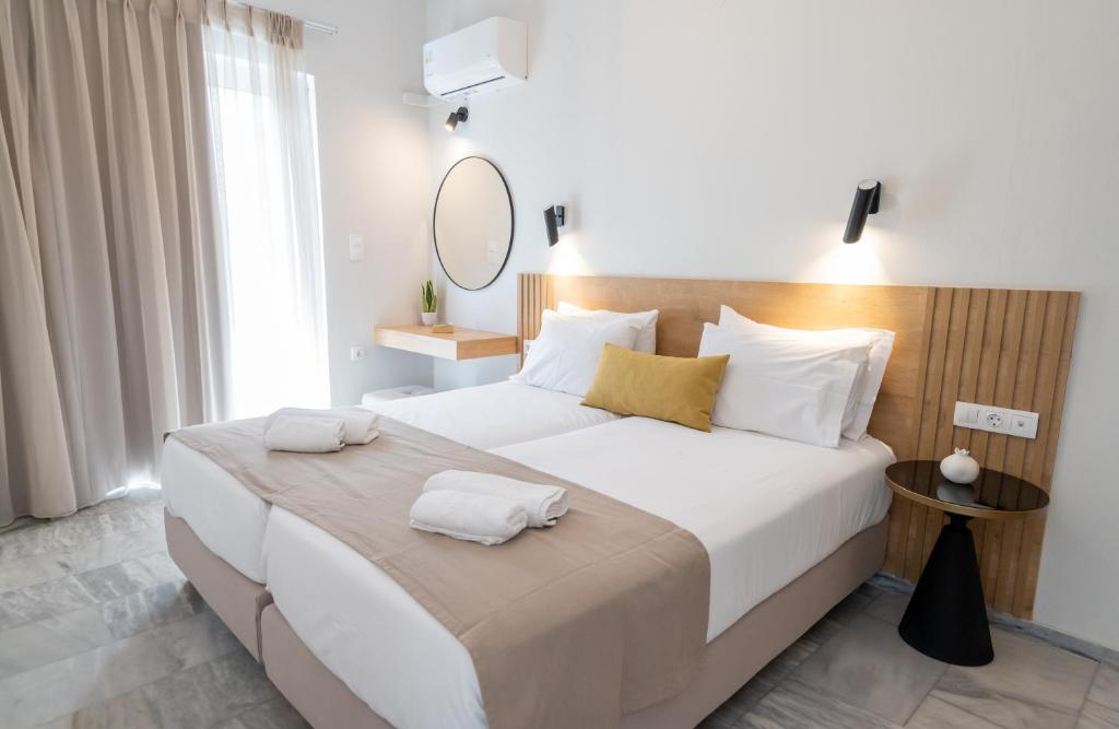 Postel nebo postele na pokoji v ubytování Mardinik Hotel Apartments