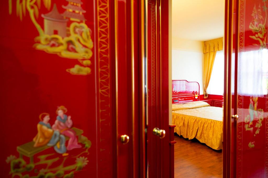 Postel nebo postele na pokoji v ubytování Melas Hotel