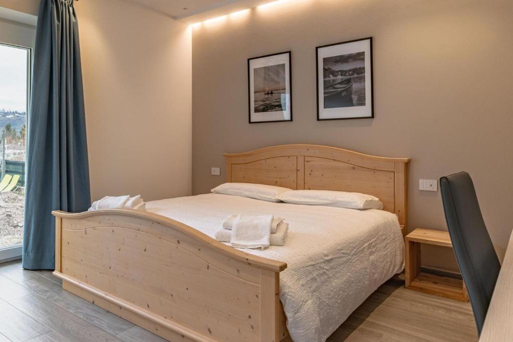 Postel nebo postele na pokoji v ubytování B&B A Un Passo Dal Lago, Caldonazzo