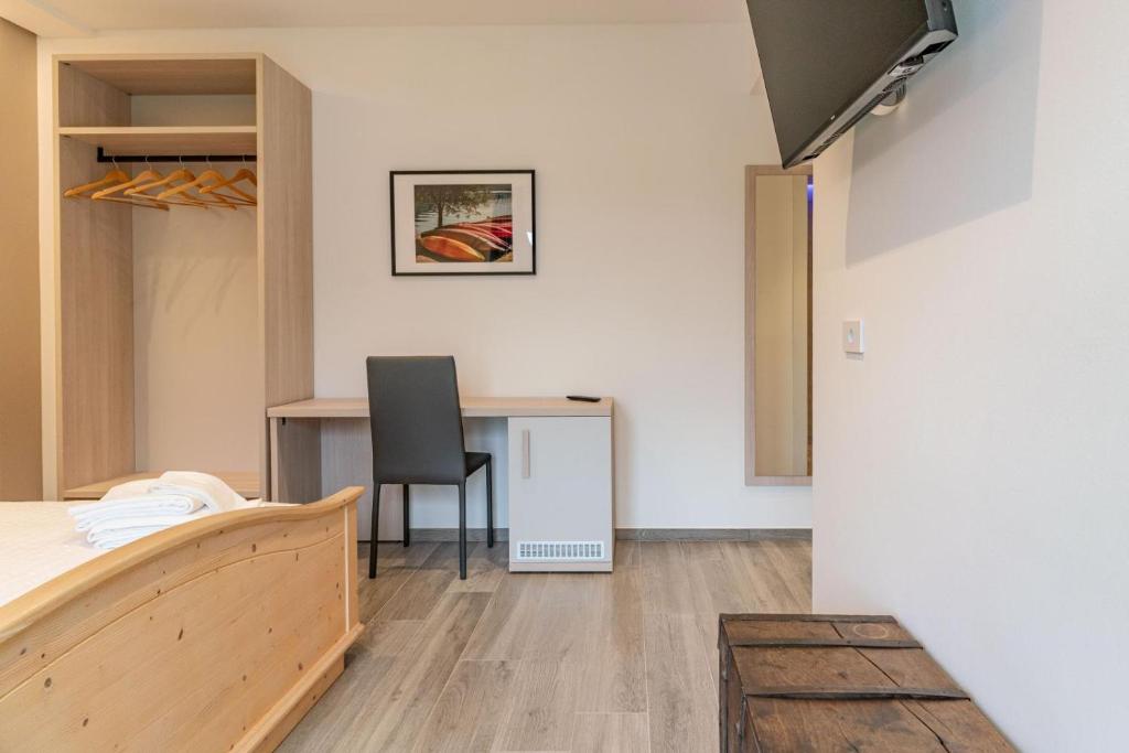 Postel nebo postele na pokoji v ubytování B&B A Un Passo Dal Lago, Caldonazzo