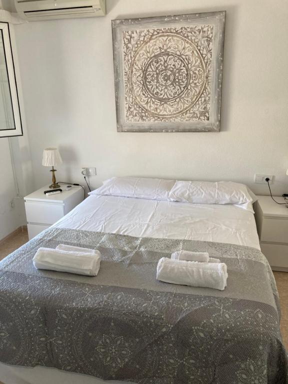 Posteľ alebo postele v izbe v ubytovaní Apartamento, Sol y Playas