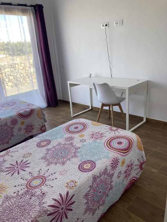 Posteľ alebo postele v izbe v ubytovaní Rosa de la laguna