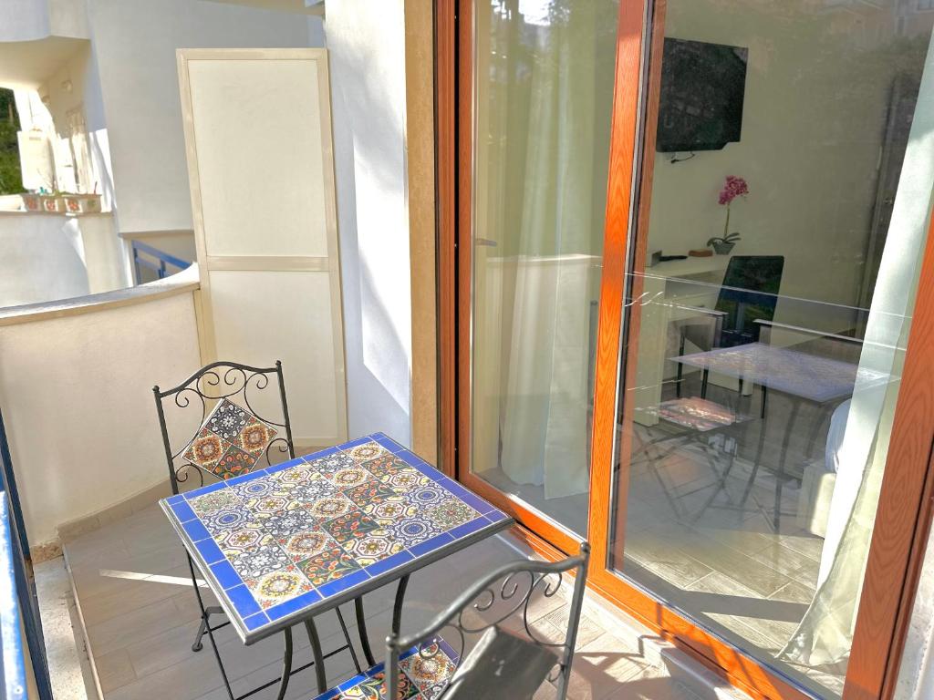Kuchyň nebo kuchyňský kout v ubytování Room Center Sorrento Baby
