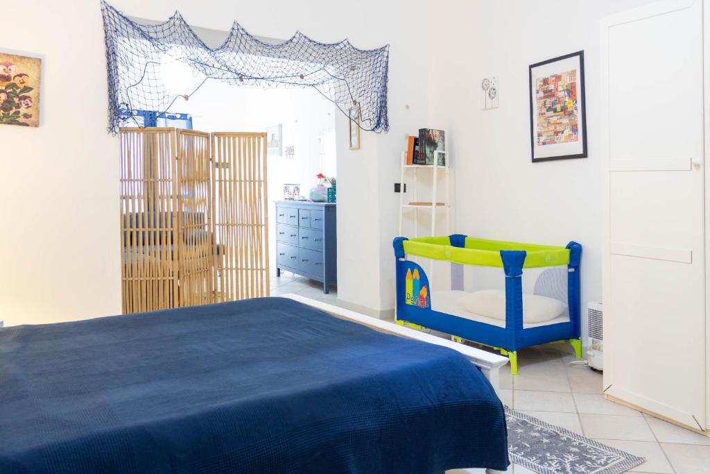 Postel nebo postele na pokoji v ubytování DOMU DE TUNI Sa Buttega
