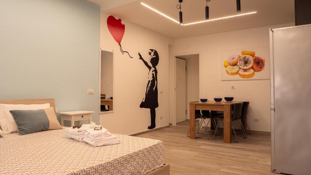 A bed or beds in a room at Wanderlust Guesthouse