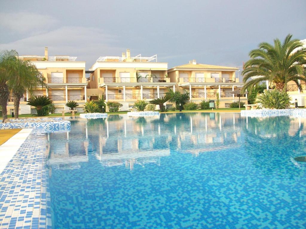 Bazén v ubytování CASAS DEL MAR - Oliva Nova - Primera línea de Playa nebo v jeho okolí