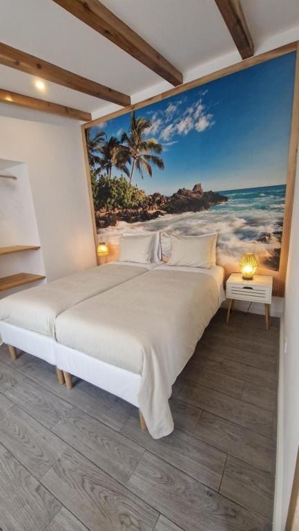 Postel nebo postele na pokoji v ubytování Santa Cruz Villas