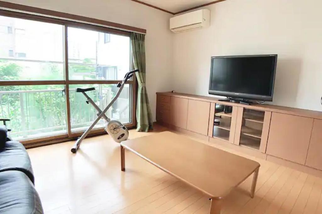 Телевизор и/или развлекательный центр в Itsukaichi First Villa Hiroshima - Vacation STAY 15653