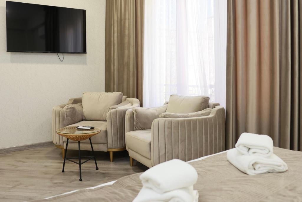 Posezení v ubytování Royal Renaissance Hotel