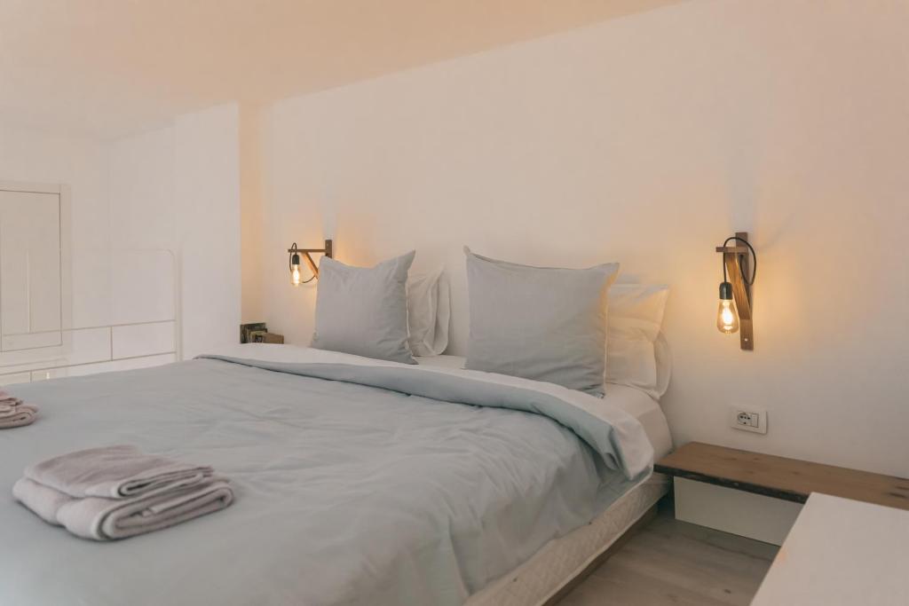 Postel nebo postele na pokoji v ubytování Sun&Moon Ohridlake Apartments