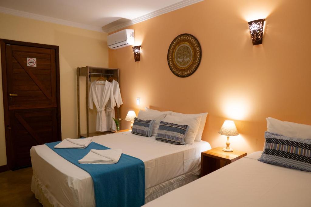 Cama o camas de una habitación en Pousada Lua Clara