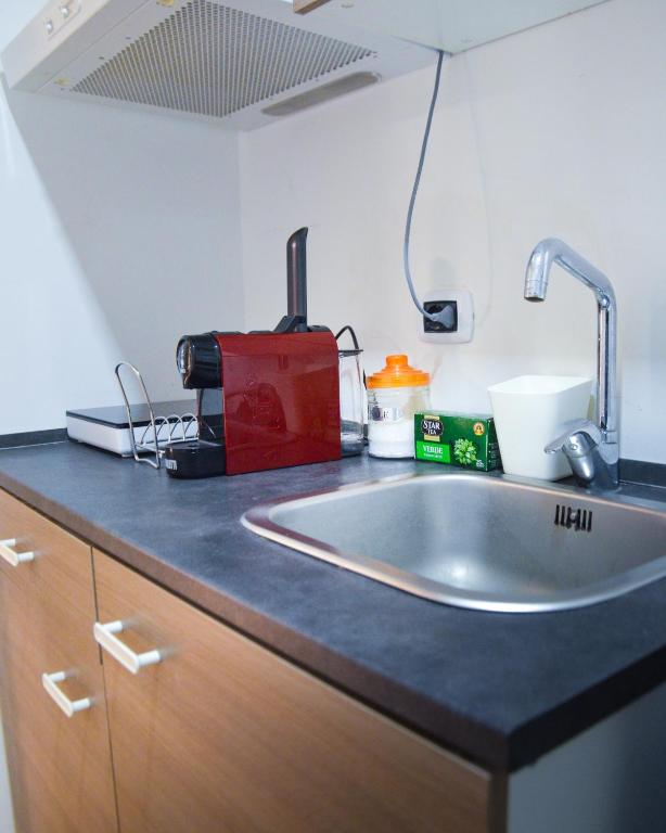 Kuchnia lub aneks kuchenny w obiekcie MANZONI 10 APARTAMENT