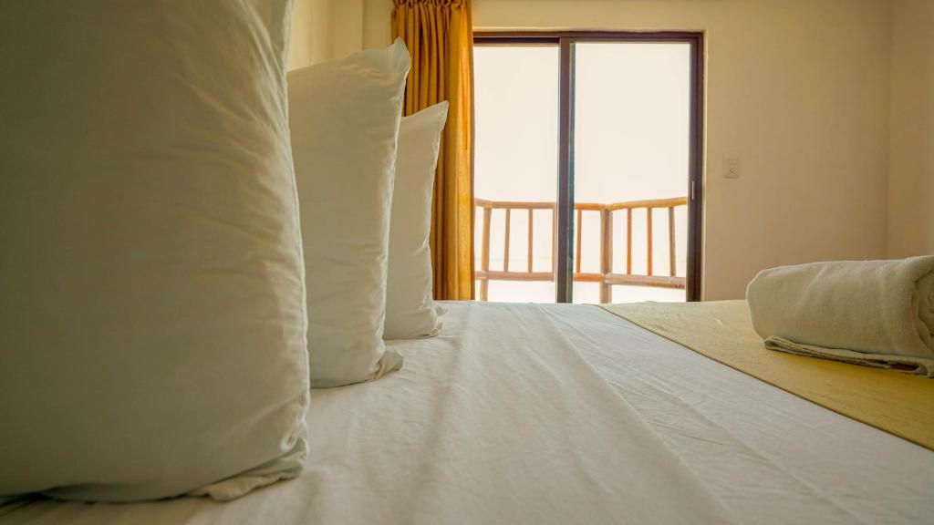 Postel nebo postele na pokoji v ubytování Hotel Rio Lagartos